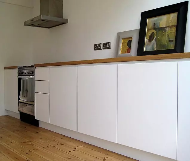 White sprayed satin-finish doors with moulded handles